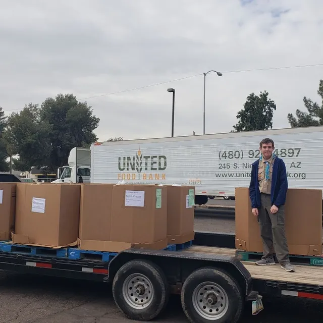 Pack 88 Scout helping with food bank donation drive in Gilbert Arizona